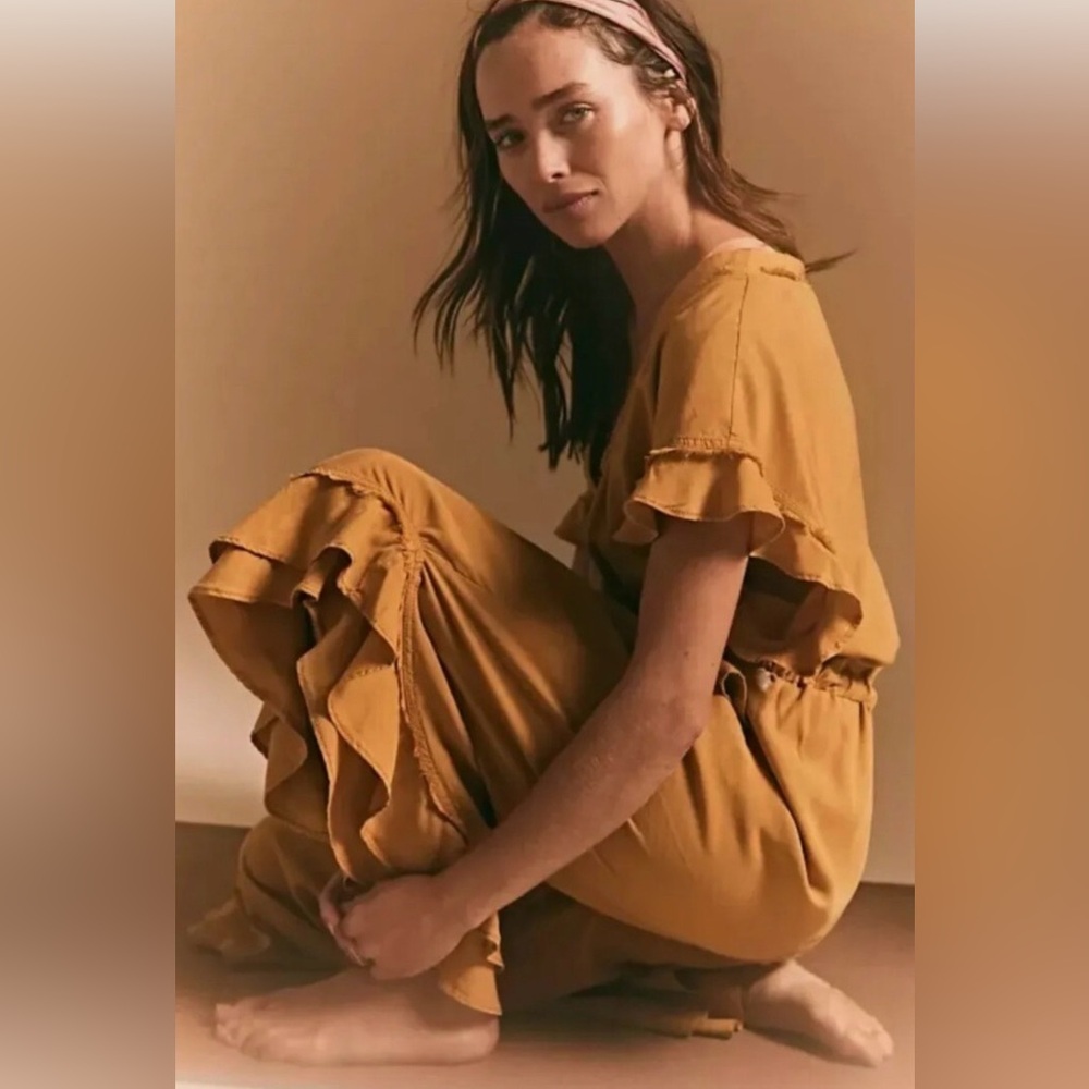 FP Movement by Free People Mustard Jumpsuit, size XS. New with out tag.